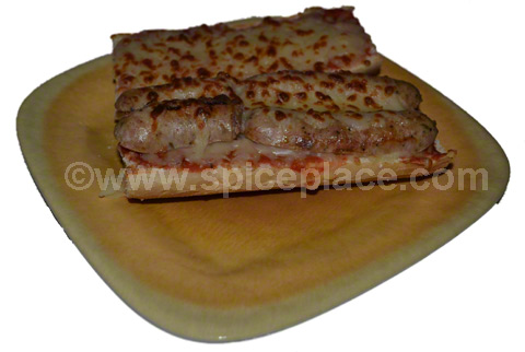 https://www.spatiniseasoning.com/wp-content/uploads/2012/03/spatini-italian-sausage-sandwich.jpg